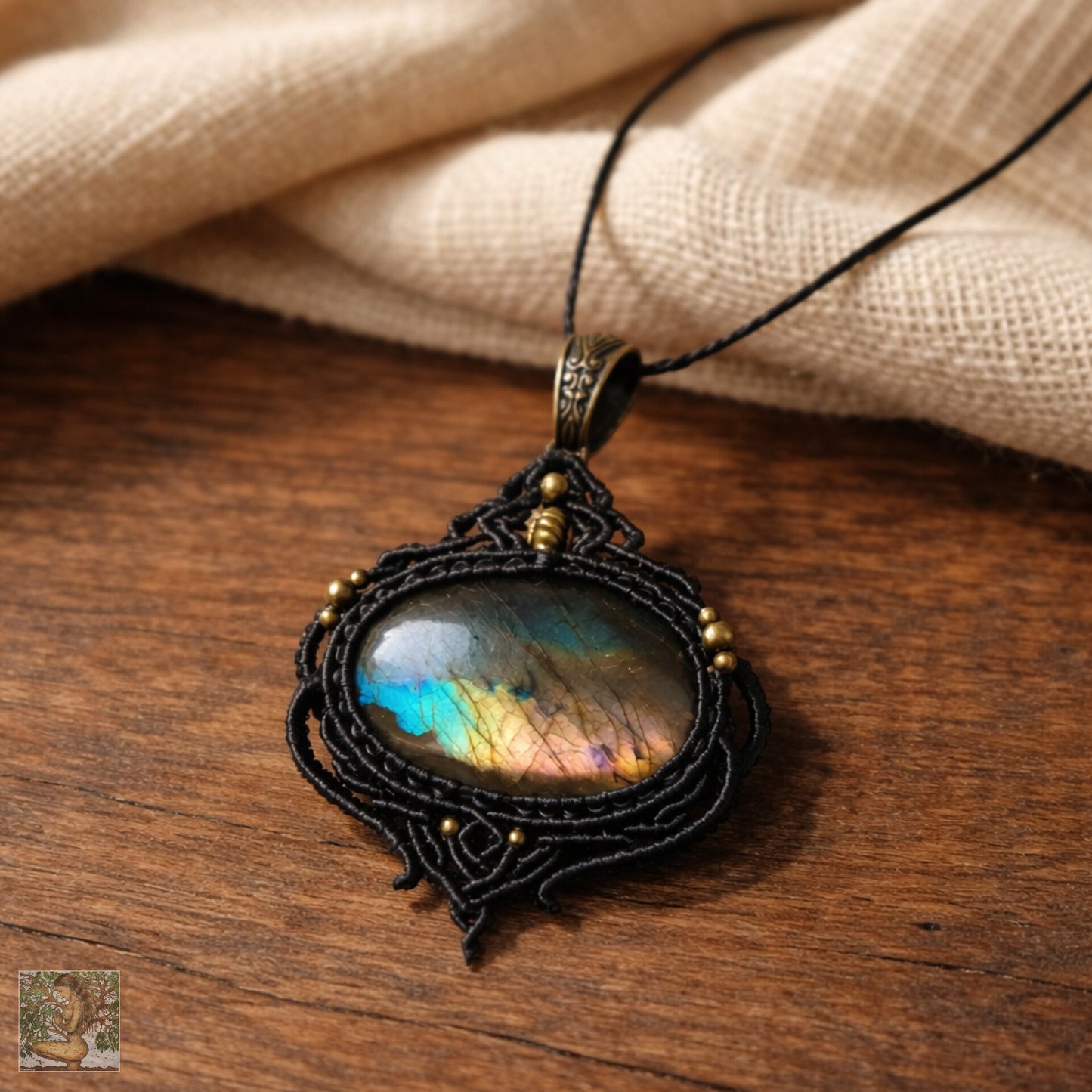 Blue, Gold & pink Flash Labradorite Wrapped in Black