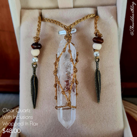 Clear Quartz With Inclusions Wrapped in Flax