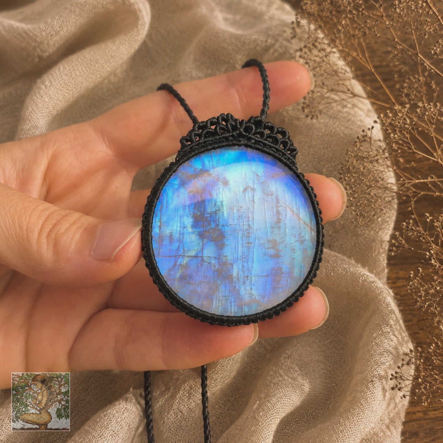 Rainbow Moonstone Wrapped in Black