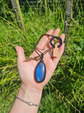 Blue Flash Labradorite Wrapped in Black