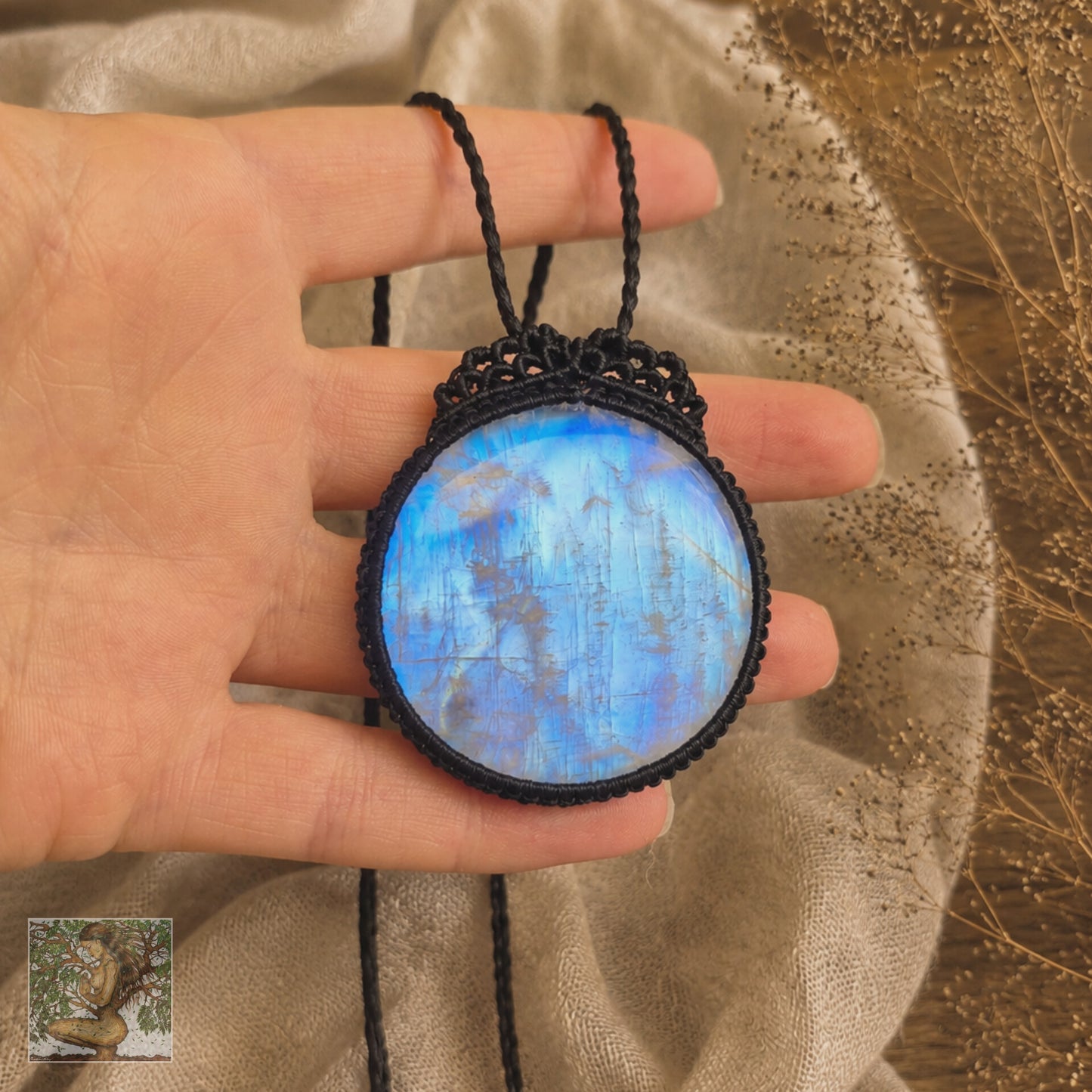 Rainbow Moonstone Wrapped in Black